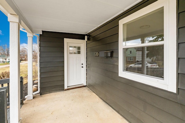 entrance to property with a porch