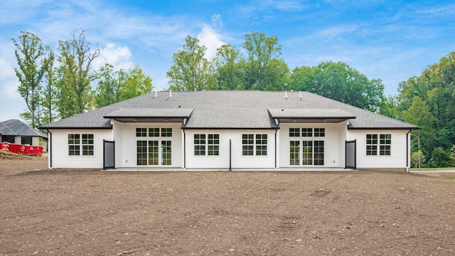 rear view of house with a patio