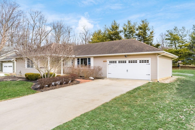 single story home featuring a garage and a front lawn