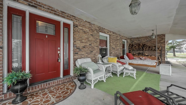 doorway to property with covered porch