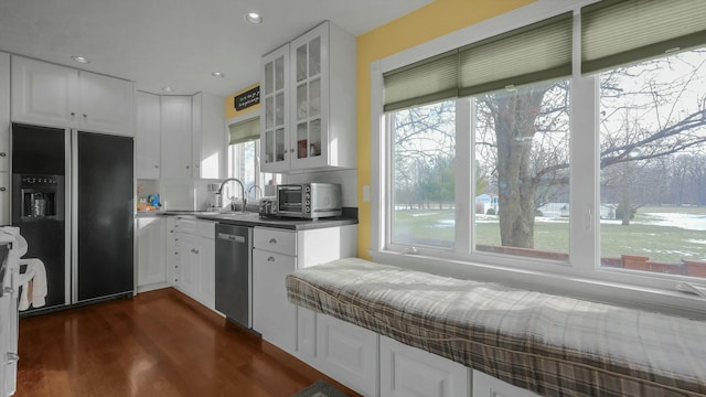 kitchen with dishwasher, white cabinets, dark hardwood / wood-style flooring, and black refrigerator with ice dispenser