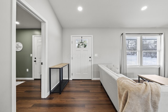 foyer entrance with dark hardwood / wood-style flooring