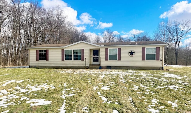 view of front of home featuring a yard