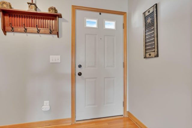 doorway to outside featuring hardwood / wood-style flooring