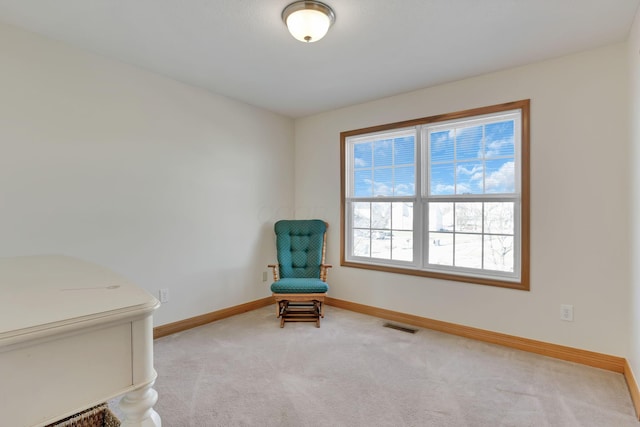 unfurnished room with light carpet