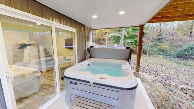 view of patio / terrace featuring a hot tub