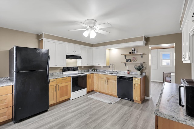 kitchen with sink, ceiling fan, black appliances, light brown cabinetry, and light wood-type flooring