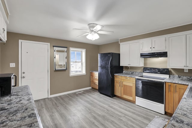 kitchen featuring electric range oven, black refrigerator, ceiling fan, light hardwood / wood-style floors, and white cabinets