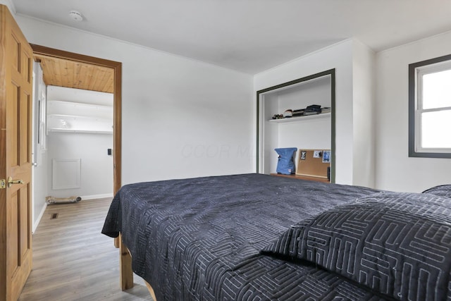 bedroom with wood-type flooring