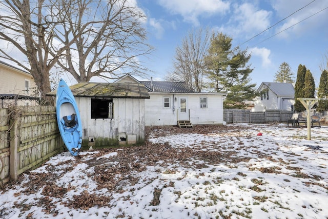 view of snow covered property