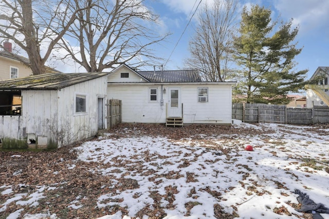 view of snow covered property