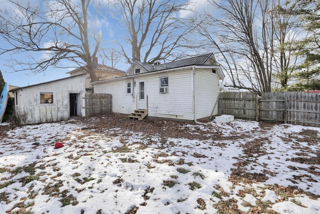 view of snow covered property