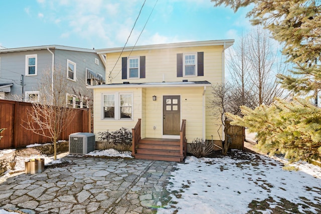 view of front of property with cooling unit