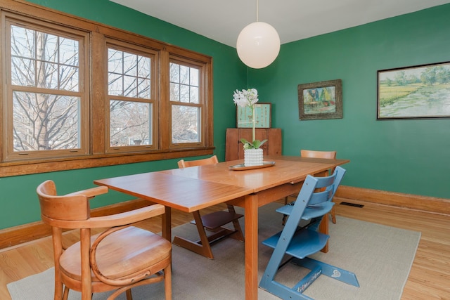 dining room featuring light wood-type flooring