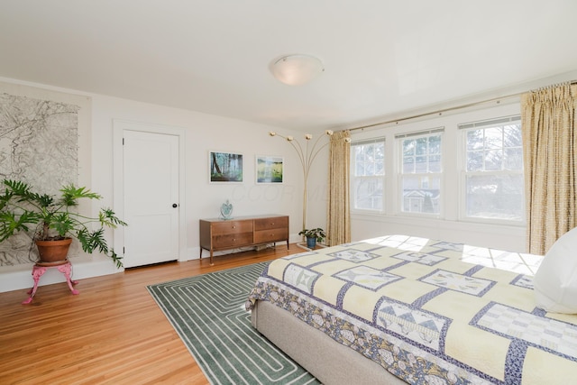 bedroom featuring hardwood / wood-style flooring