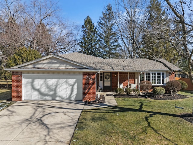 single story home featuring concrete driveway, brick siding, and a front yard