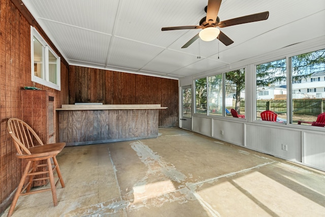 exterior space featuring ceiling fan