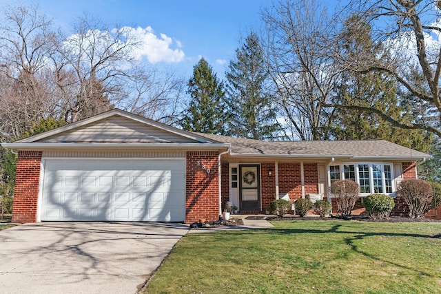 ranch-style home with a garage, a front yard, concrete driveway, and brick siding