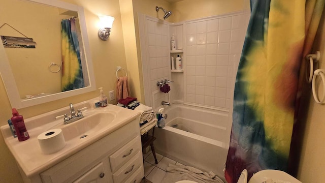 bathroom with tile patterned flooring, vanity, and shower / bath combo