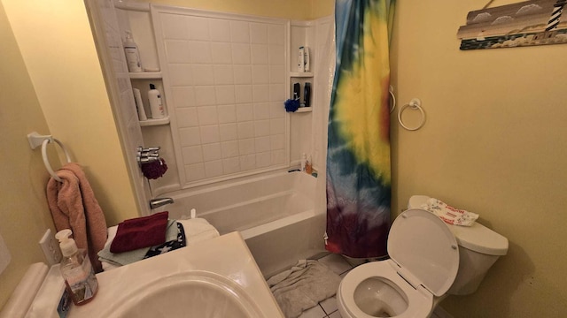 full bathroom with tile patterned flooring, sink, shower / bath combination with curtain, and toilet