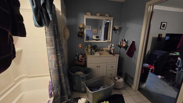 bathroom with vanity, tile patterned floors, and shower / bath combo with shower curtain