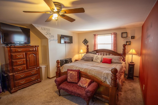 bedroom with ceiling fan and light carpet