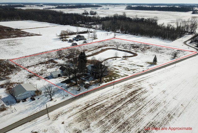 snowy aerial view with a rural view