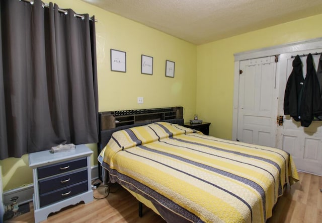 bedroom featuring light hardwood / wood-style floors