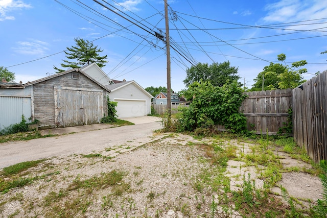 view of yard with a garage