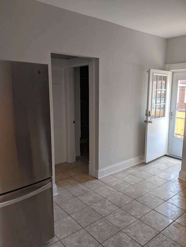 interior space featuring light tile patterned floors