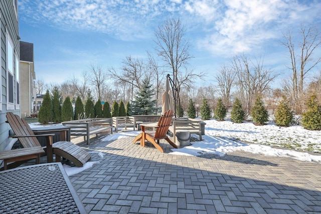 view of snow covered patio