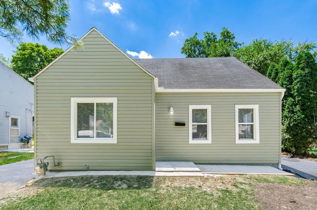 rear view of property with a patio area