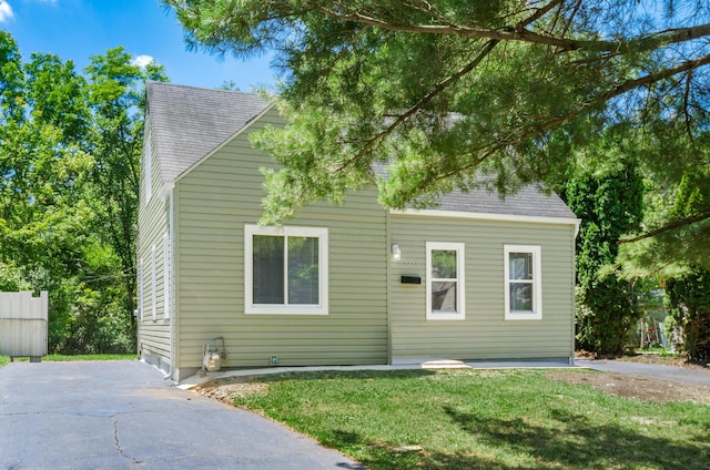 view of front of home with a front yard