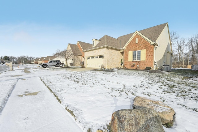 view of front of property featuring central AC