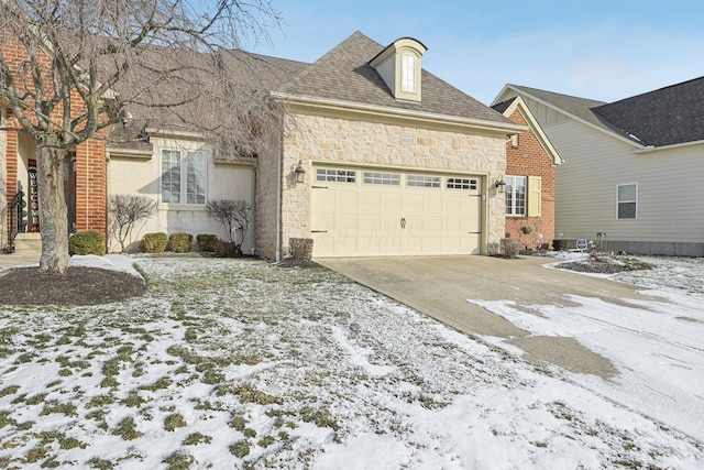 view of front of home with a garage