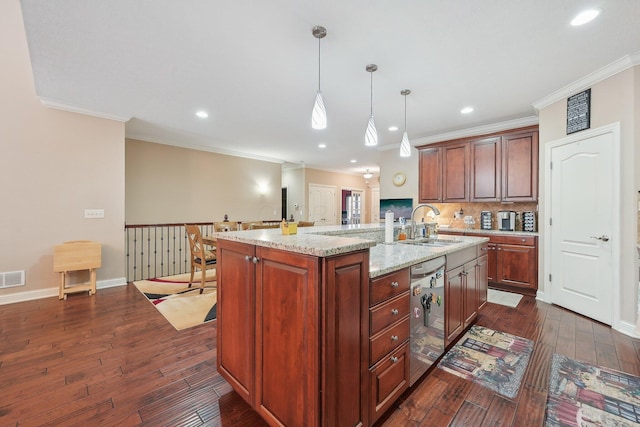 kitchen with sink, dishwasher, a kitchen island with sink, hanging light fixtures, and light stone countertops