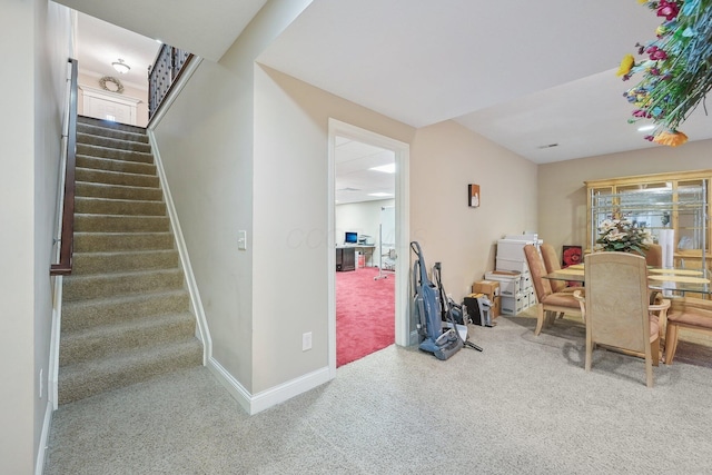 view of carpeted dining area