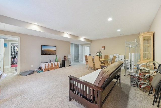 bedroom featuring light carpet