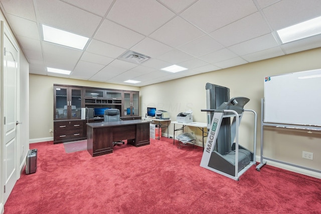 office space featuring carpet flooring and a paneled ceiling