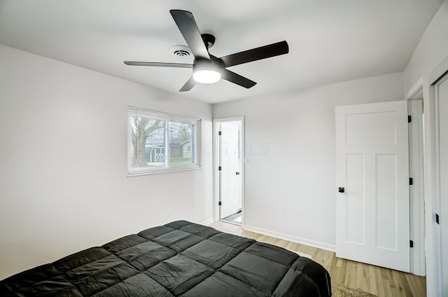 bedroom featuring ceiling fan and light wood-type flooring