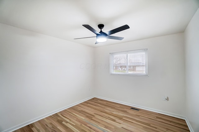 unfurnished room featuring ceiling fan and light hardwood / wood-style floors