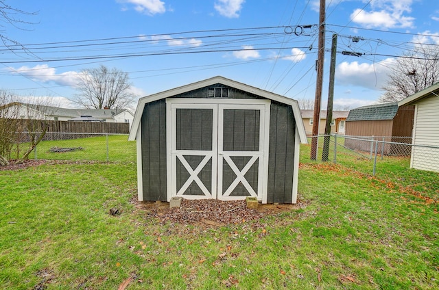 view of outdoor structure with a yard