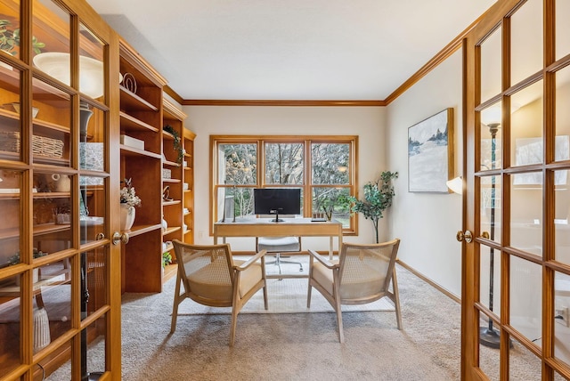 office area featuring ornamental molding, french doors, and carpet flooring