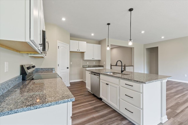 1233 Heathgate Way, Fairborn, OH 45324 - kitchen featuring stainless steel dishwasher, electric stove, light wood-style floors, white cabinetry, and an island with sink