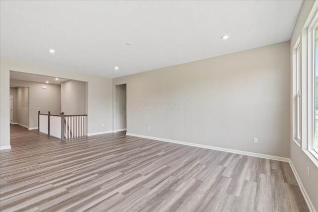 1233 Heathgate Way, Fairborn, OH 45324 - unfurnished room featuring light wood finished floors and recessed lighting