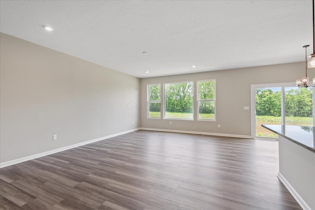 1233 Heathgate Way, Fairborn, OH 45324 - unfurnished room with dark wood-type flooring, a chandelier, and recessed lighting