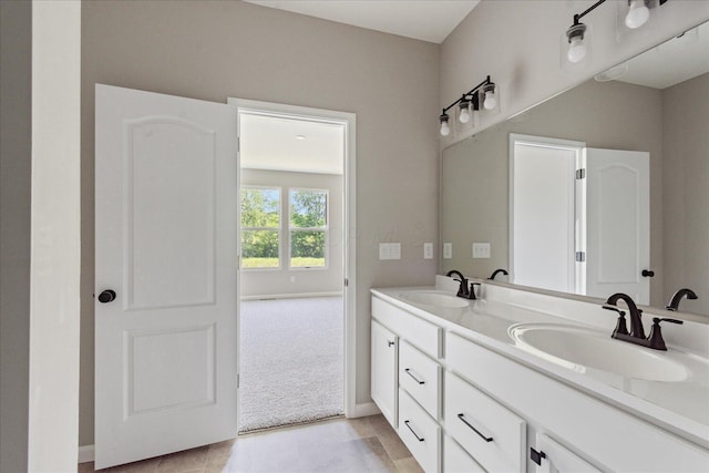 1233 Heathgate Way, Fairborn, OH 45324 - bathroom with double vanity and baseboards