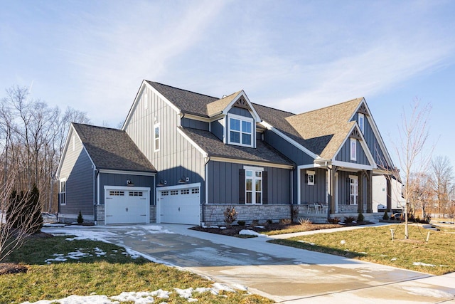 craftsman house with a garage, a front yard, and a porch