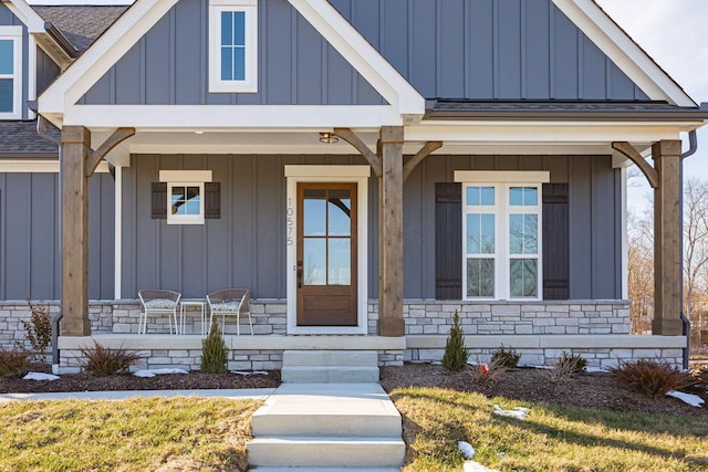 entrance to property with a porch