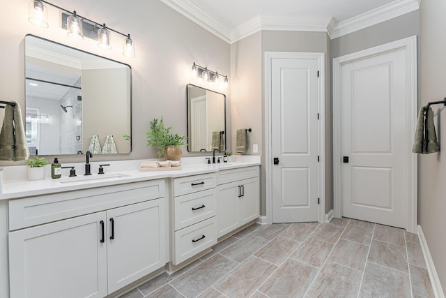 bathroom with crown molding, vanity, and walk in shower